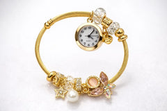 Golden Women's Bracelet Watch with Chic Dial and Elegant Strap